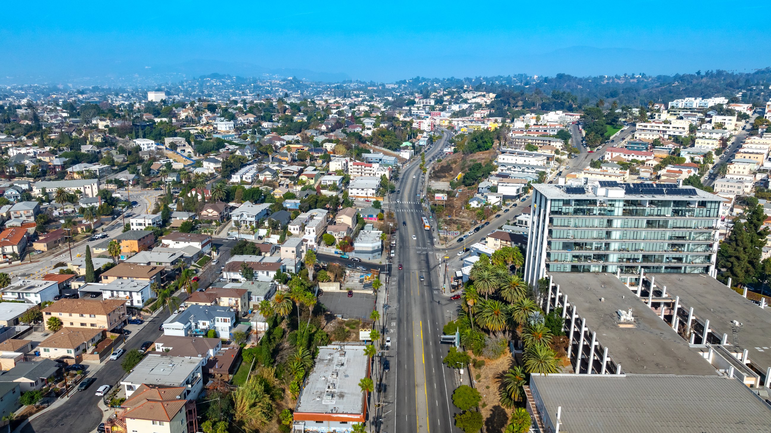 Aerial looking northwest along Sunset Boulevard at the site